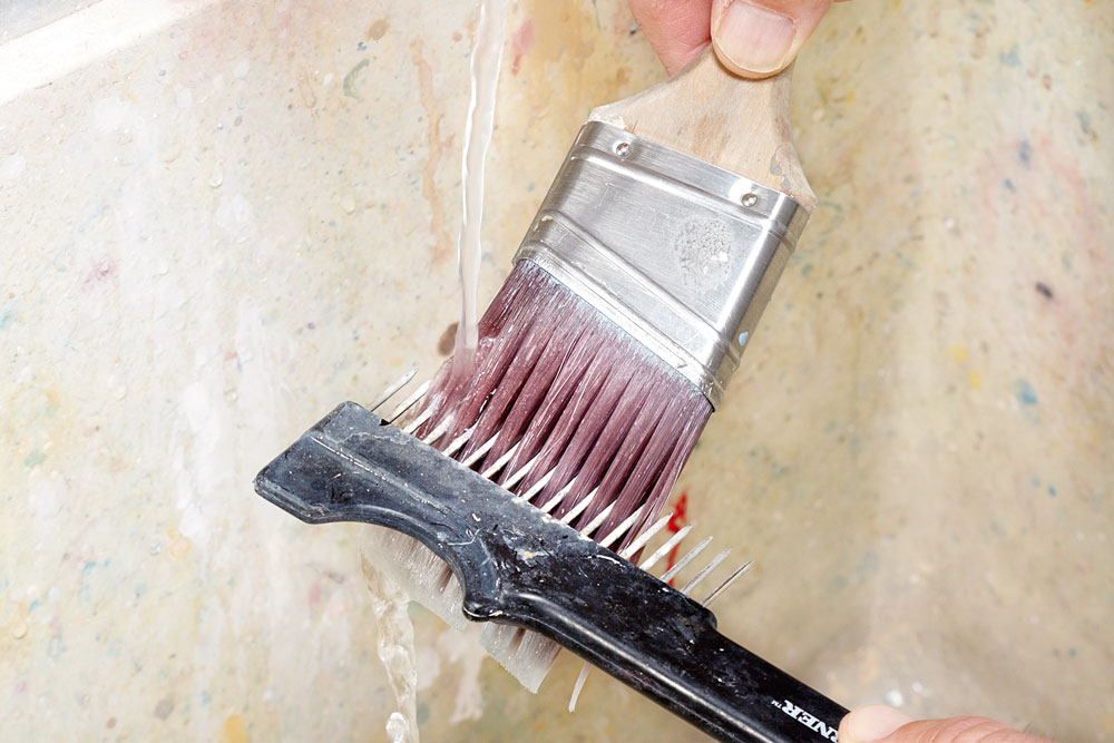 Clean brushes with a paintbrush comb