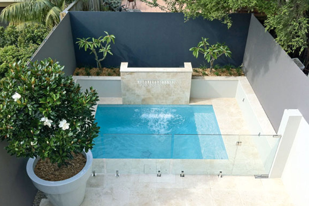 A mini pool is created in a small backyard space