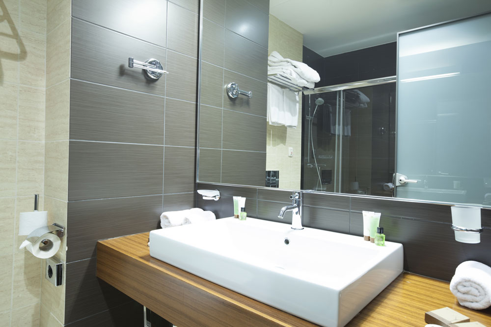 Wall Mount A Bathroom Mirror Australian Handyman - How To Attach Mirror Bathroom Tiles