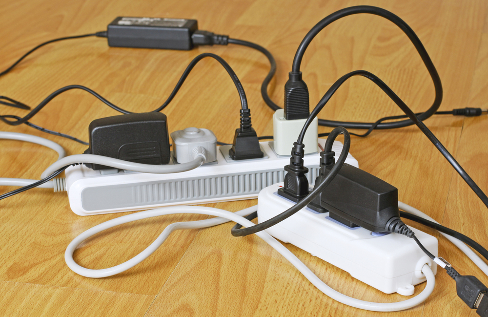 Never plug a power board into another power board