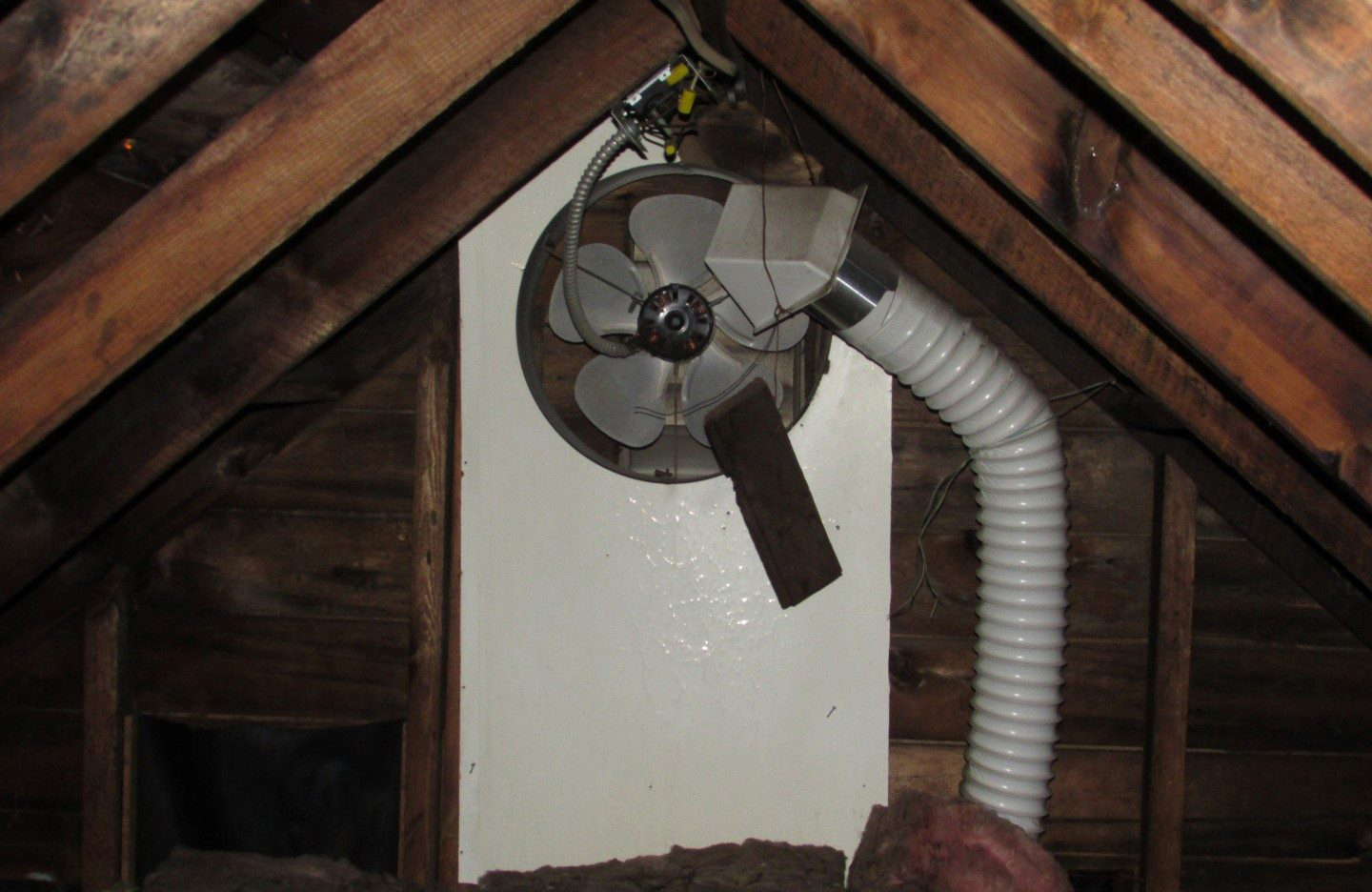 Bath fan venting to attic or roof space