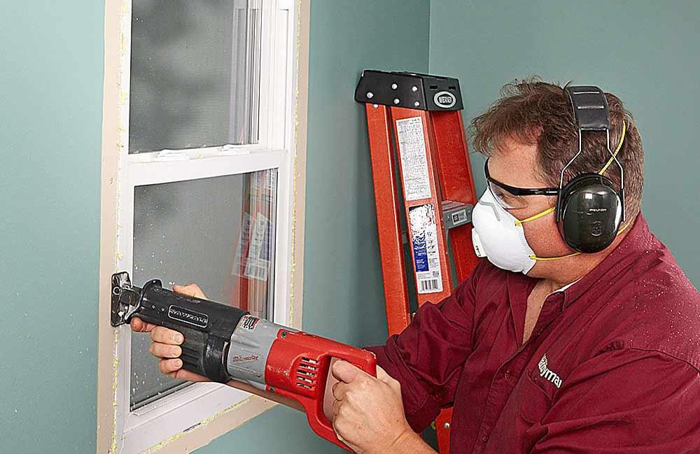 Cut around the window with a recip saw