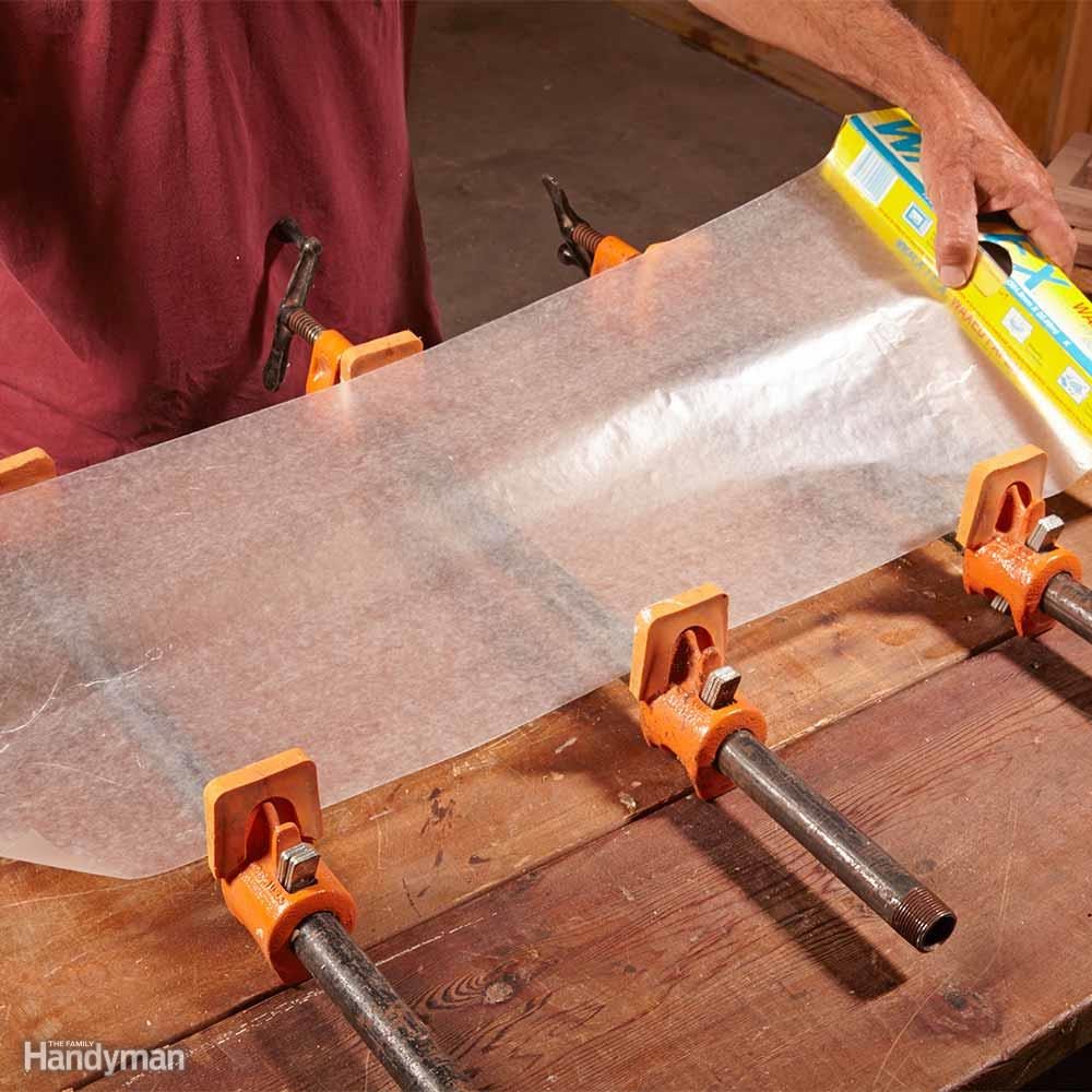 Cover bar clamps with wax paper