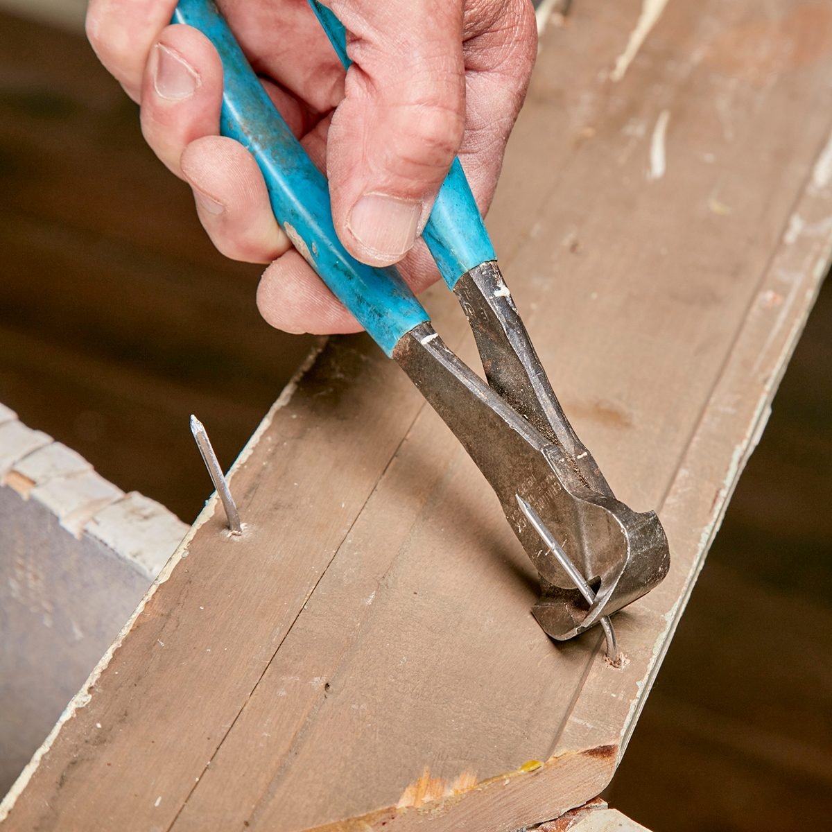 Pull nails through the back with a nippers