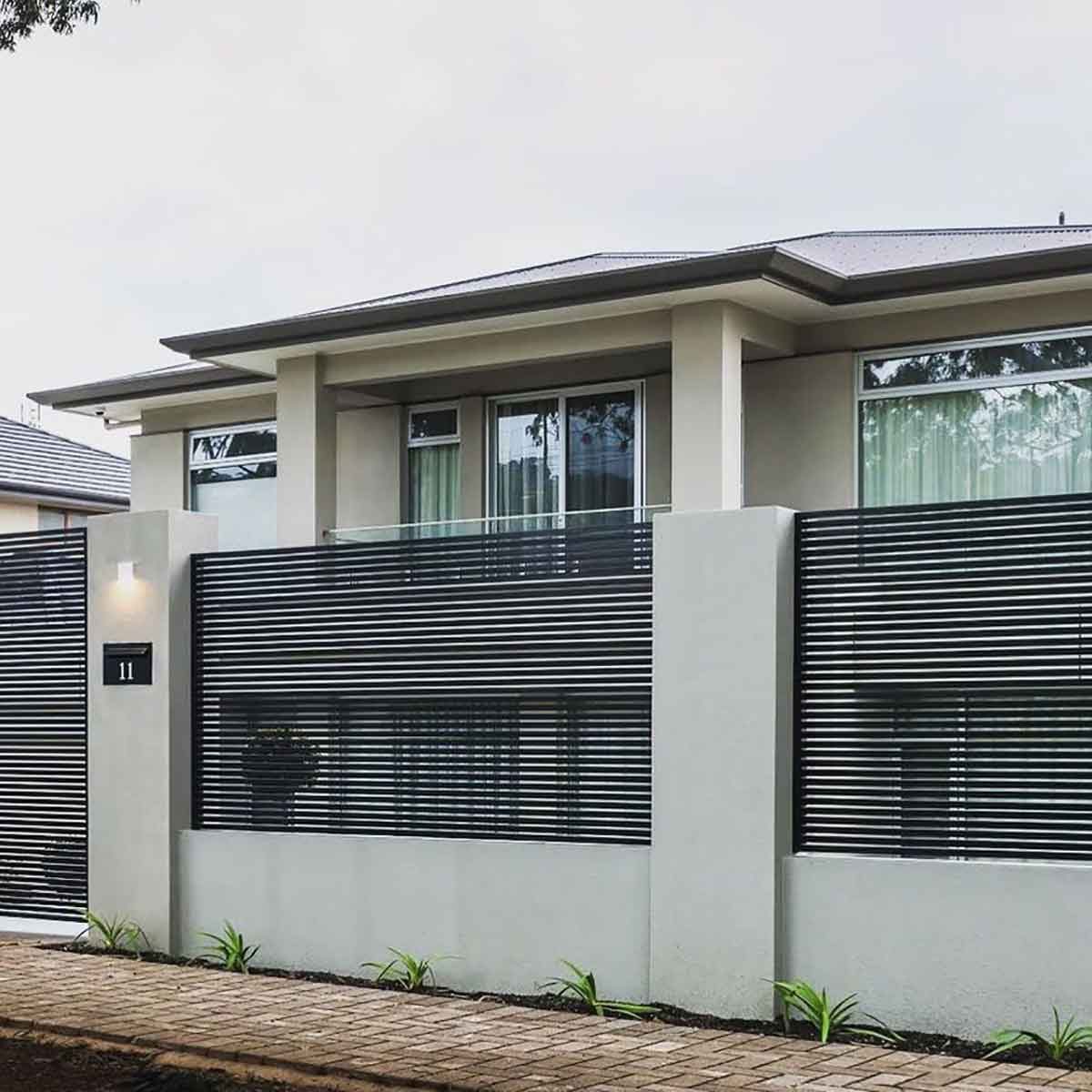 Masonry and aluminium front yard fence
