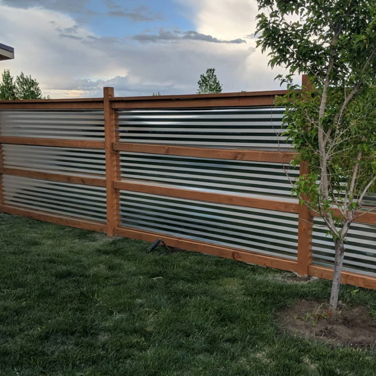 Corrugated metal privacy fence