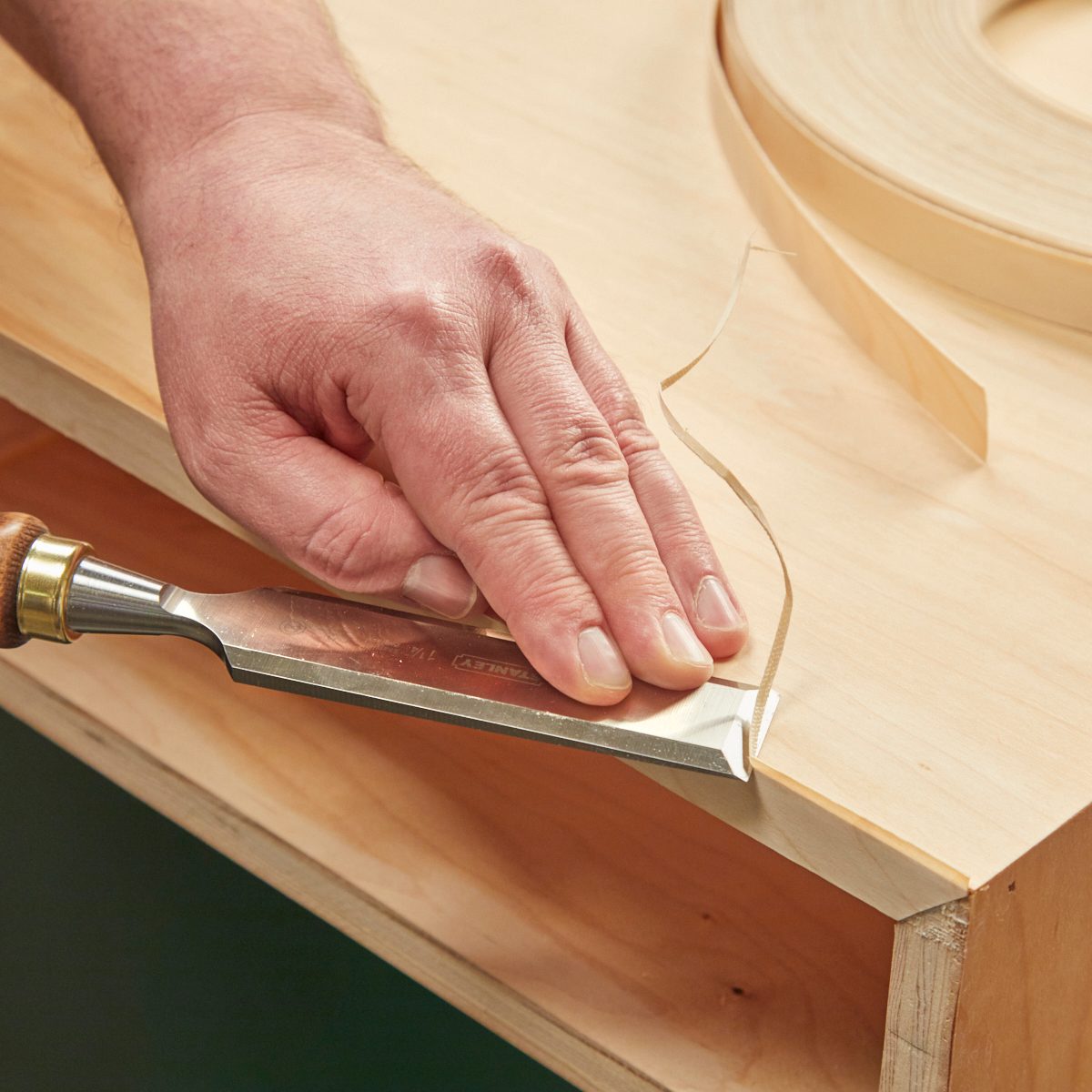 Trim edge banding with a chisel