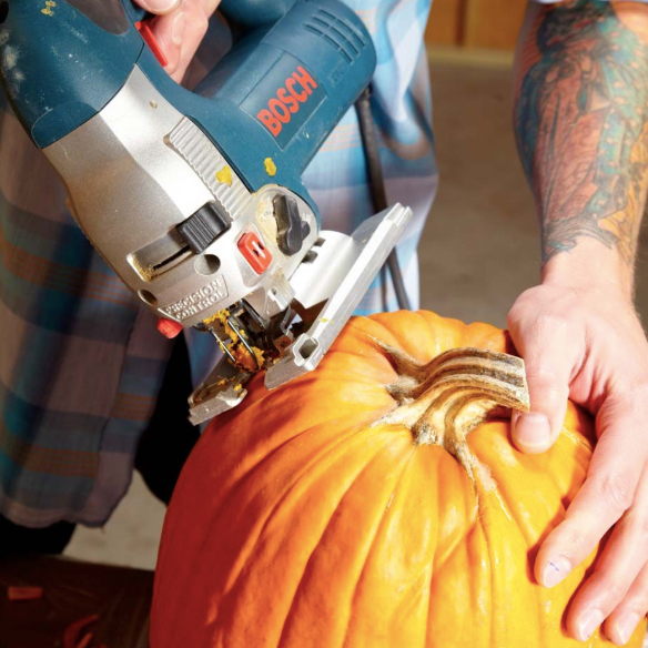 Use your jigsaw to cut the top of the pumpkin