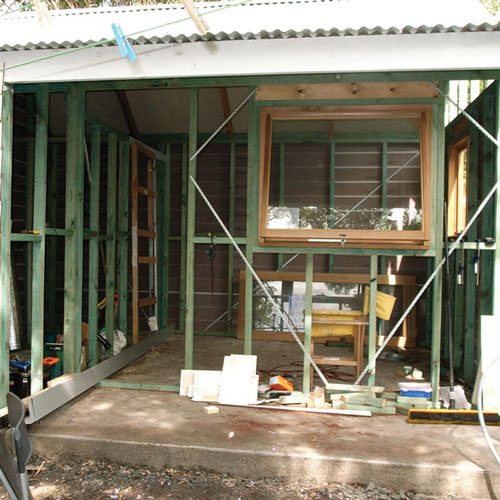 timber frame of a backyard cabin 