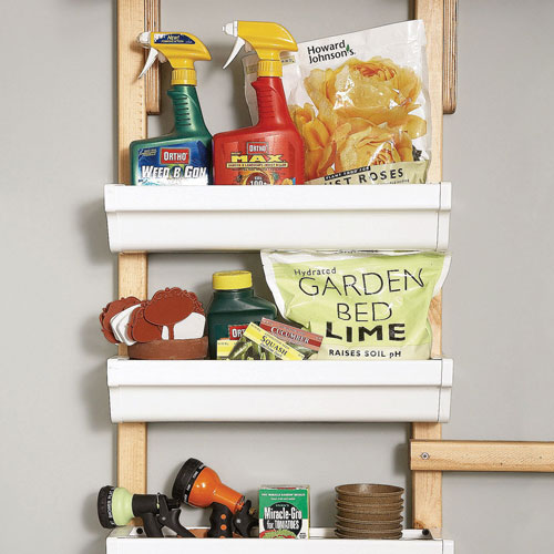 vertical storage idea, offcuts and plastic tubs 