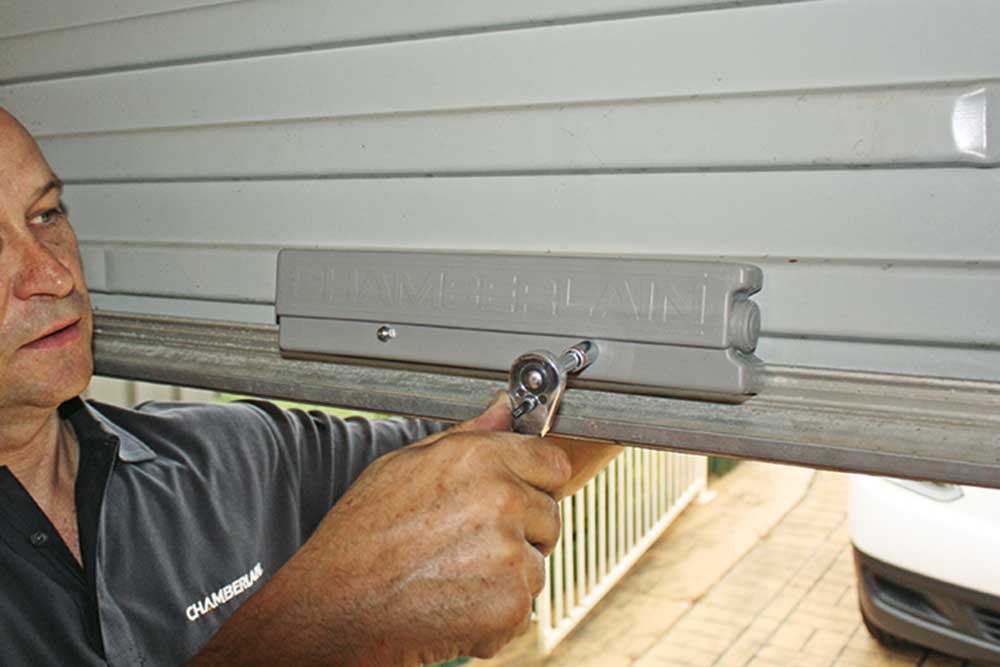 adding a weighted bar to A garage door, handyman magazine, 