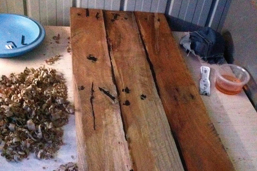 Hardwood timber pallet with black Silastic in joints