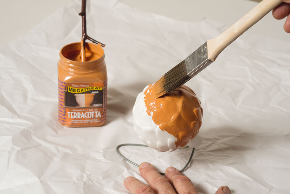 DIY, Handyman Magazine, painting an artichoke decoration with terracotta paint 