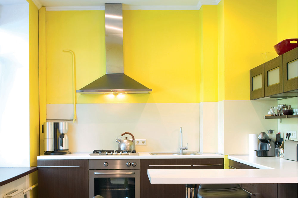 a kitchen with yellow walls, handyman magazine, 