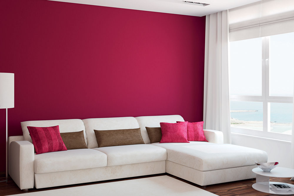 white couch, pink wall, 