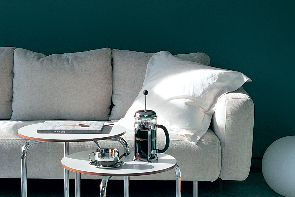 white couch, green wall, handyman, 