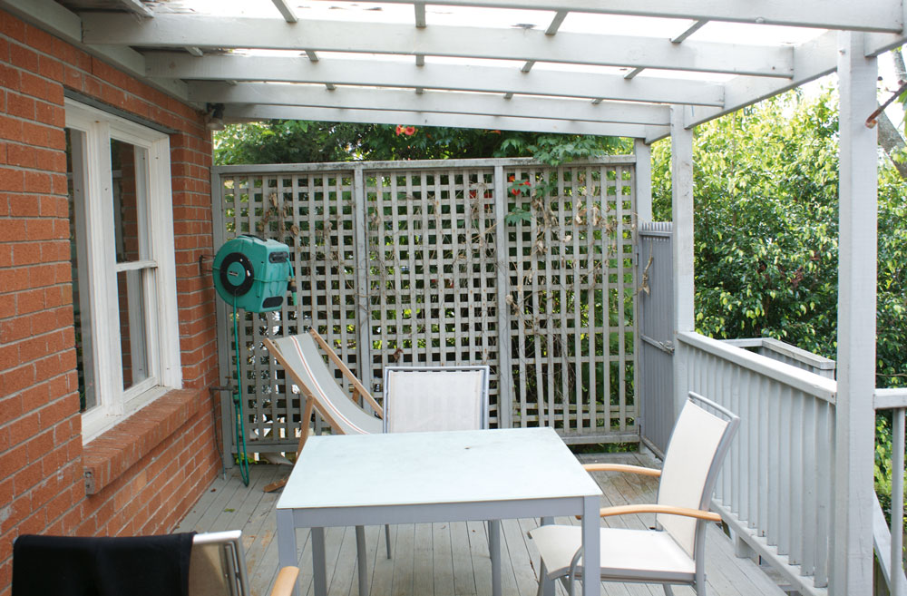 amazing beach house renovation, before shot, handyman magazine, a deck before being renovated, 