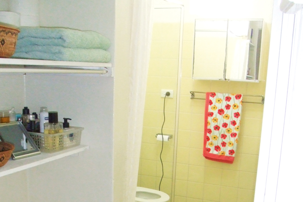 Before: Despite the space, the old bathroom had  a poor layout with little room for storage. 