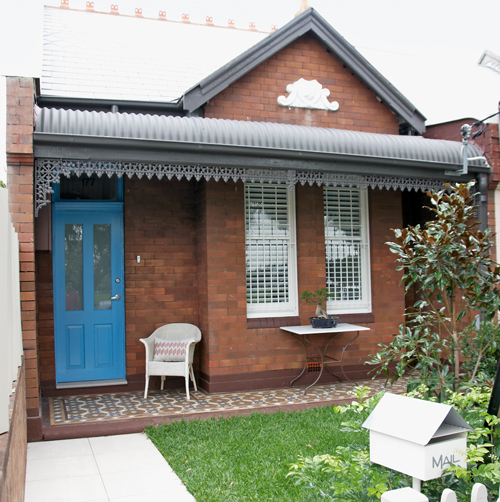 A new path and paint give the home a neat, well cared for look.